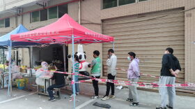 This photo taken shows residents queueing to undergo nucleic acid tests for the Covid-19 coronavirus in Shenzhen, in China's southern Guangdong province.