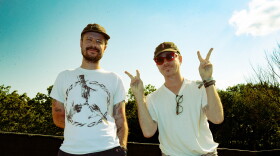 two men posing for a photograph 