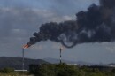 FILE - Gas is flared at the Jose Antonio Anzoategui oil complex in Barcelona, Anzoategui State, Venezuela, Tuesday, Jan. 9, 2024. (AP Photo/Matias Delacroix, File)