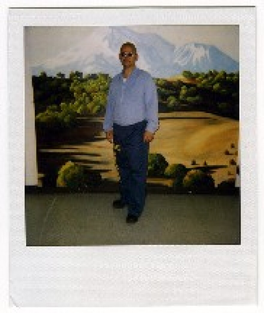 A prison visiting room photo of Mark Watts, who found an unlikely ally in his fight for parole -- the attorney who prosecuted him.