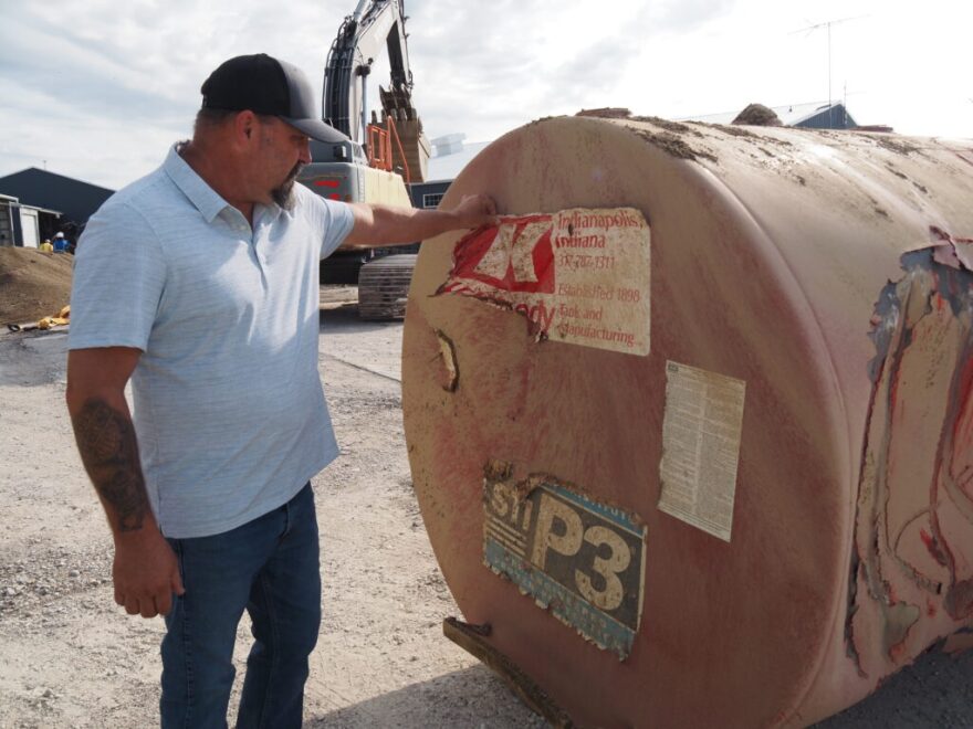 Morgan County Highway Department Superintendent Eddie Fisher looks at a 30-year-old underground storage tank after its removal in Martinsville, Indiana, on Wednesday, July 22, 2026.