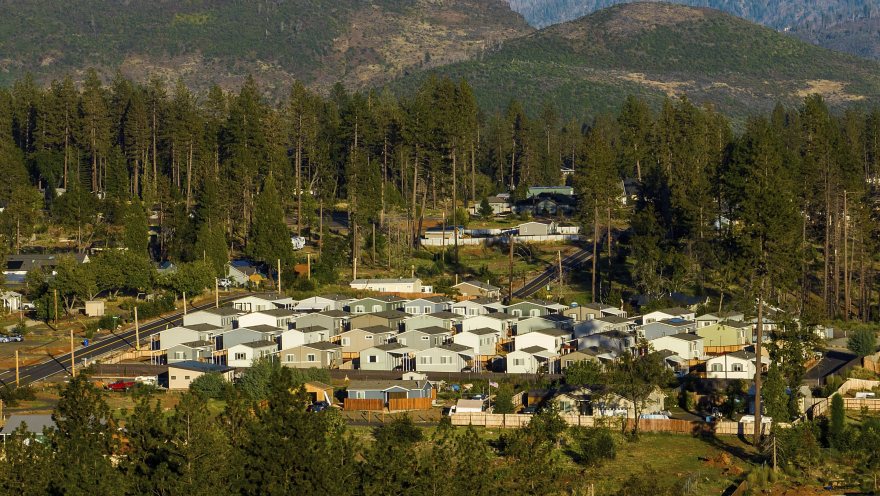 Homes built after the Camp Fire line a hillside at Paradise Mobile Estates, Thursday, Oct. 26, 2023, in Paradise, Calif.