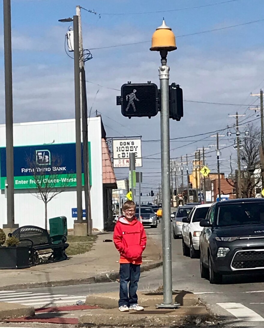 Levi Hagedorn poses with an island light at Glenway and Cleves-Warsaw.