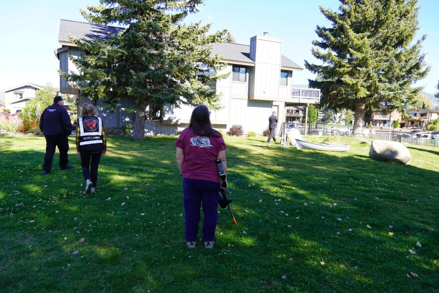Kathi Zollinger of the BEAR League responds to a call from a neighbor in the Tahoe Keys neighborhood in South Lake Tahoe.