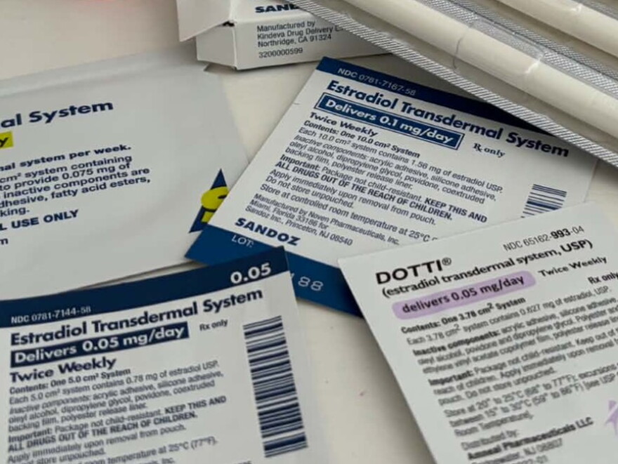 A pile of estrogen patches sits on the table in Hayley Harris’ home in San Diego.