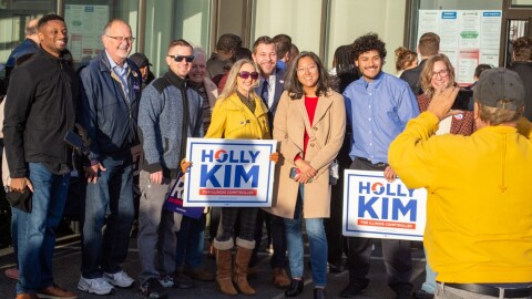 Lake County Treasurer Holly Kim stands with supporters outside the Illinois State Board of Elections in Springfield on petition filing day on Oct. 27, 2025.