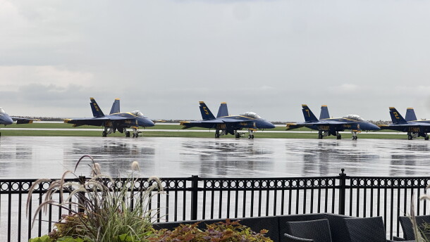 Blue Angels sit at Burke Lakefront Airport, waiting for the skies to clear before they can practice.