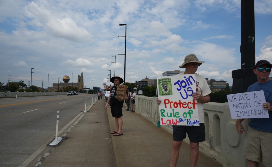 Demonstrators participate in Indivisible Knoxville’s Labor of Love protest on Henley Street Bridge in Knoxville on September 1, 2025.