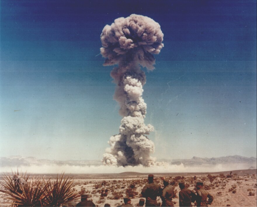 Observers watch a bomb go off at the Nevada Test Site during the Buster-Jangle series in the fall of 1951.