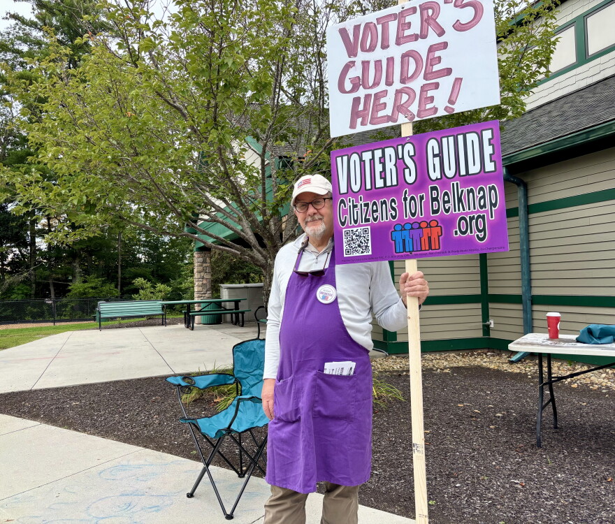 Brian Beihl, of the nonpartisan Citizens for Belknap, hands out voter’s guides at the polls in Meredith. He said several Republican candidates declined to attend the group’s candidate forums or answer its questionnaire.