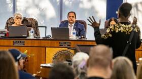   City of North Miami Beach Mayor Anthony F. DeFillipo flanked by Commissioners Phyllis Smith (far left) and Fortuna Smukler listen as a resident speaks at the City chambers as they discussed the hiring of a new city attorney during the first meeting where all commissioners attended after a judge ordered them to do so, on Tuesday March 21, 2023.