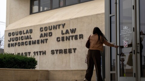 Hearings began in Lawrence on Wednesday to decide whether a judge will temporarily reverse the ban on gender affirming care for minors.