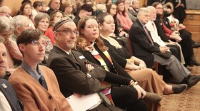Few empty seats remained as supporters and opponents of the bill packed into the committee room. 