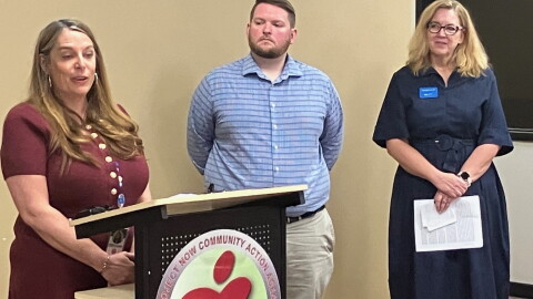 Andrea Flannery (left), director of Project NOW Head Start, speaks at the Rock Island agency Thursday, Sept. 17, as Ryan Sempf of United Way Quad Cities and Marcy Mendenhall of SAL Community Services look on.