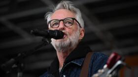 Billy Bragg performs from the stage in Parliament Square during a protest against the State Visit of U.S. President Donald Trump on September 17, 2025 in London England. (Leon Neal/Getty Images)