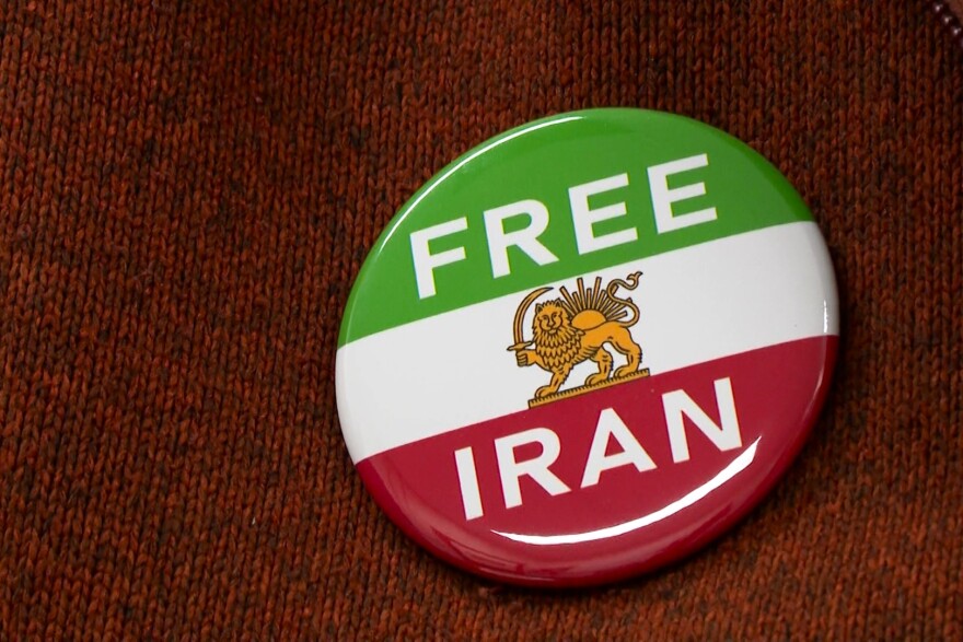 Babak Seradjeh wears a "Free Iran" pin. Sereadjeh and other Iranians hope to see the son of Iran's last Shah, Reza Pahlavi, will lead the country.