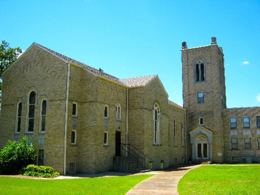 First Baptist Church in Pocahontas.  Some of the stone pillars on top of the bell tower fell through the roof of the church during a Sunday morning storm.