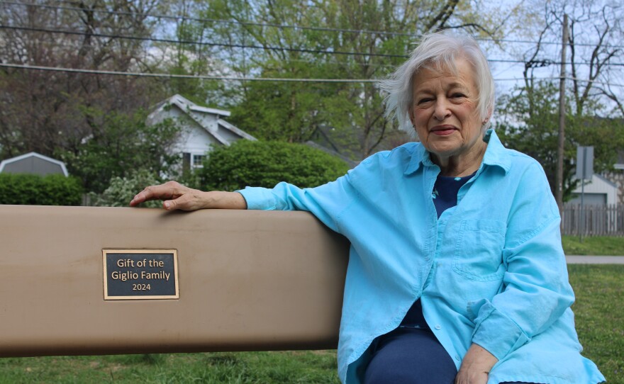 Fran Giglio, one of the women who have worked on the Phelps Grove Grove gardens from the beginning and who has donated several items, including benches and a pavilion (photo taken in April 2025).