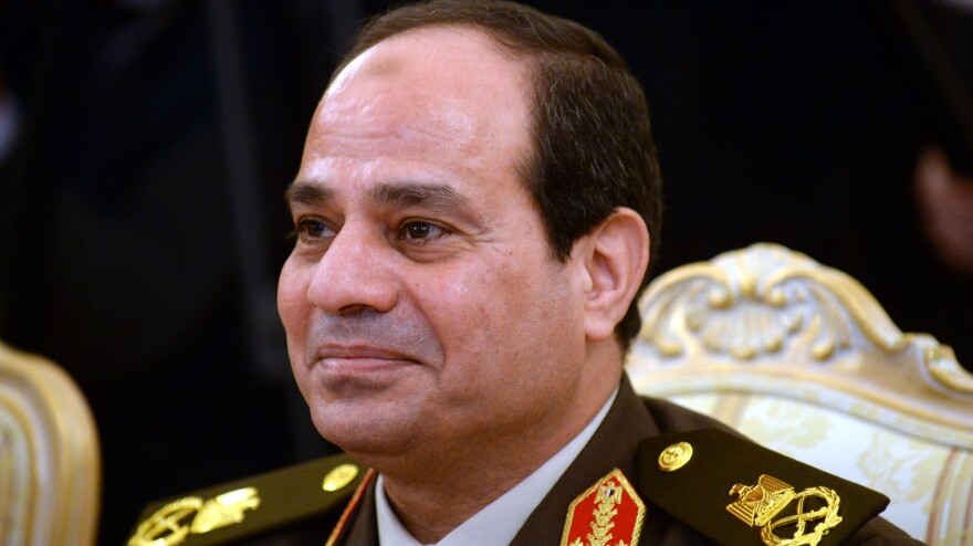 Egyptian army chief Abdel Fattah al-Sisi smiles during a visit to Moscow, on Feb. 13. He is popular among many Egyptians and is considered likely to run for president.