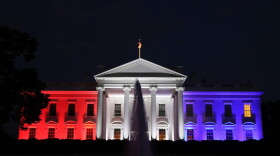 The White House is bathed in red, white and blue light as part of the Fourth of July celebration July 4, 2020 in Washington, DC. President Trump is hosting a “Salute To America” celebration that includes flyovers by military aircraft and a large fireworks display. (Photo by Win McNamee/Getty Images)