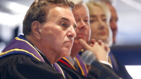In this photo made on Thursday, Jan. 7, 2016, Pennsylvania Supreme Court Justices Max Baer, left, Chief Justice Thomas G. Saylor, center, Debra Todd, center right, and Kevin M. Doughtery, right, sit at the dais during the swearing in ceremony for fellow Justice David N. Wecht at Duquesne University in Pittsburgh. (AP Photo/Keith Srakocic)