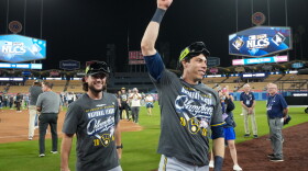 Milwaukee Brewers designated hitter Christian Yelich celebrates after Game 4 of baseball's National League Championship Series between the Milwaukee Brewers and the Los Angeles Dodgers, Thursday, Oct. 15, 2026, in Los Angeles. (AP Photo/Gregory Bull)