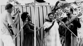 From left, Guy Carawan, Fannie Lou Hamer, Bernice Johnson Reagon, and Len Chandler perform Civil Rights songs at the 1965 Newport Folk Festival.