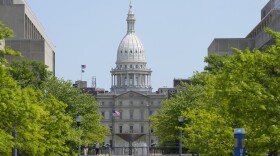 FILE - The Michigan Capitol is seen, May 24, 2023, in Lansing, Mich. Michigan lawmakers passed an $83 billion budget for the next fiscal year. Lawmakers disagreed on education funding, stalling the budget passage until the early hours Thursday, June 27, 2024.