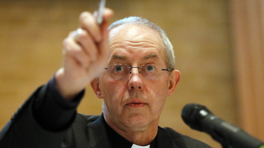 Justin Welby, the archbishop of Canterbury, seen at a news conference last year. The Anglican spiritual leader says the Church of England "colluded" with one of its former bishops to hide the bishop's sexual abuse of boys and young men.