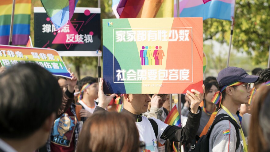 Days after Weibo announced it would ban homosexual content, an already-planned rally was held in Nanjing, China, to raise awareness of discrimination against homosexuals. This photo from Sunday was released to the AP by the Jiangsu Tongtian Volunteer Group, which said more than 20,000 people took part in the "Rainbow Marathon" event.