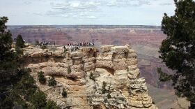 Tourist view of the Grand Canyon in Arizona 05 April 2007. (Gabriel Bouys/AFP/Getty Images)