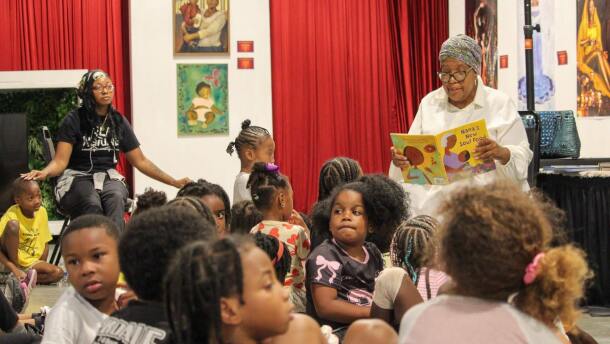 Cherice Harrison-Nelson reads to campers at Kuumba Academy in New Orleans on July 9, 2026.