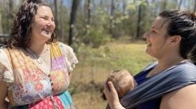 Doula Erin Jones (left) meets with new mother Stephanie LaPerle and baby Gwen.