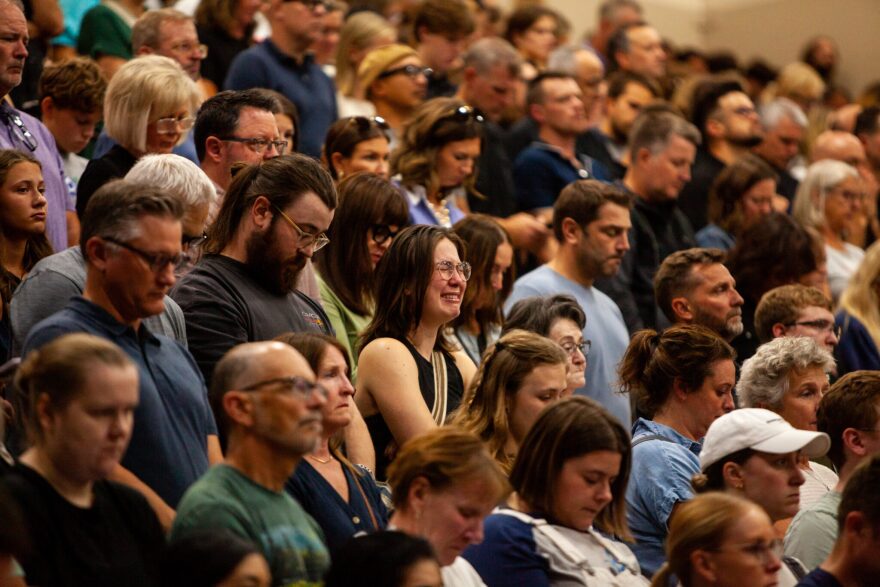 Hundreds of mourners gather at the Academy of the Holy Angels in Richfield for a vigil for the two children who were killed and the several children and parishioners injured in a shooting at Annunciation Church on Wednesday, Aug. 27, 2025 in south Minneapolis.