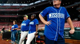 Senate Majority Leader Rep. Caleb Rowden, R-Columbia, looks to his team on Monday, Aug. 8, 2022, during the Bi-State Softball Showdown at Busch Stadium.