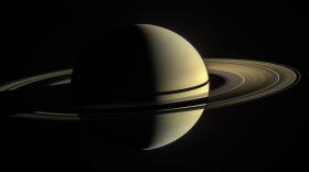 This was the Cassini spacecraft's view from orbit around Saturn on Jan. 2, 2010. In this image, the rings on the night side of the planet have been brightened significantly to more clearly reveal their features. On the day side, the rings are illuminated both by direct sunlight, and by light reflected off Saturn's cloud tops.