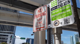 PayByPhone signs can be found around Miami. This one is in front of the WLRN studios.