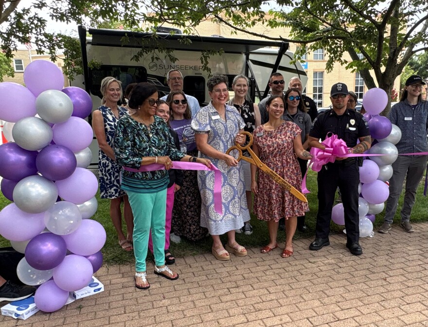 Barren River Area Safe Space, Inc. cuts the ribbon on a traveling RV that will provide domestic violence services throughout the ten counties it serves in south central Kentucky.