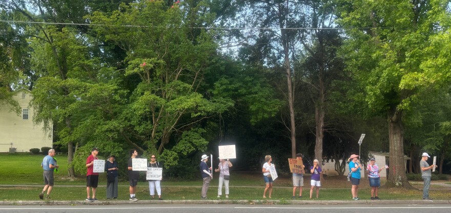 Protestors gathered in the morning to honor John Lewis and speak out against the Trump Administration.