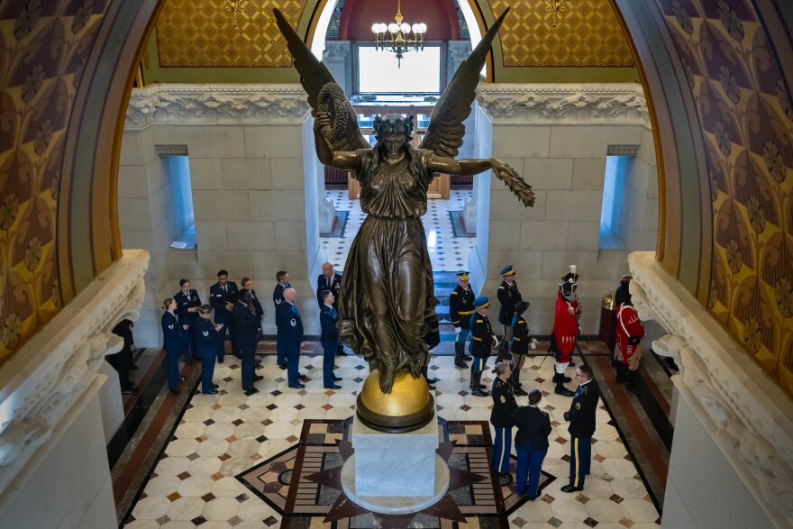 The line of colleagues, friends, civil servants, and members of the general public stretches through the capitol building as former Connecticut Governor M. Jodi Rell lies in state at the Capitol before funeral services on December 3, 2024.