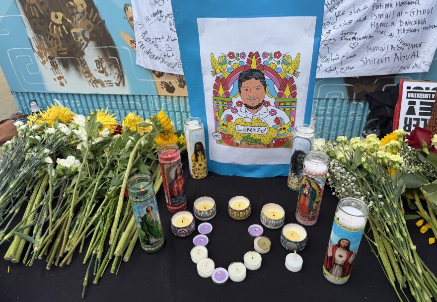 Attendees brought candles and flowers to remember Lorenzo Salgado Araujo.