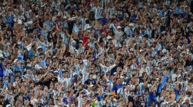 Fans of Argentina cheer during the World Cup Group J soccer match between Argentina and Algeria in Kansas City, Mo., Tuesday, June 16, 2026.