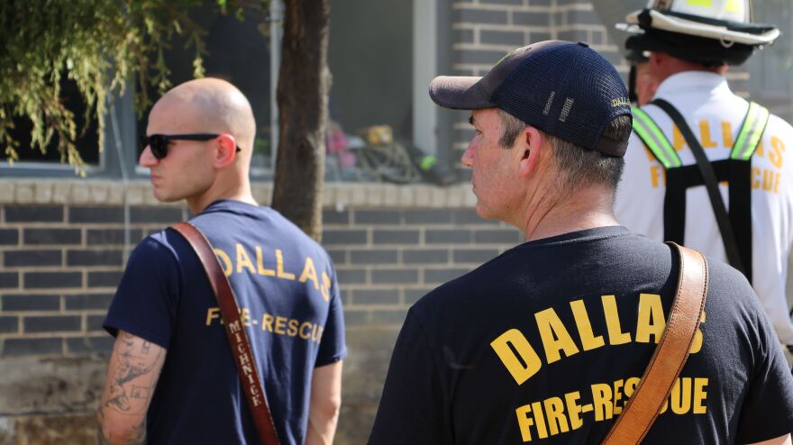 Dallas Fire-Rescue workers responding to a partial building collapse in June.