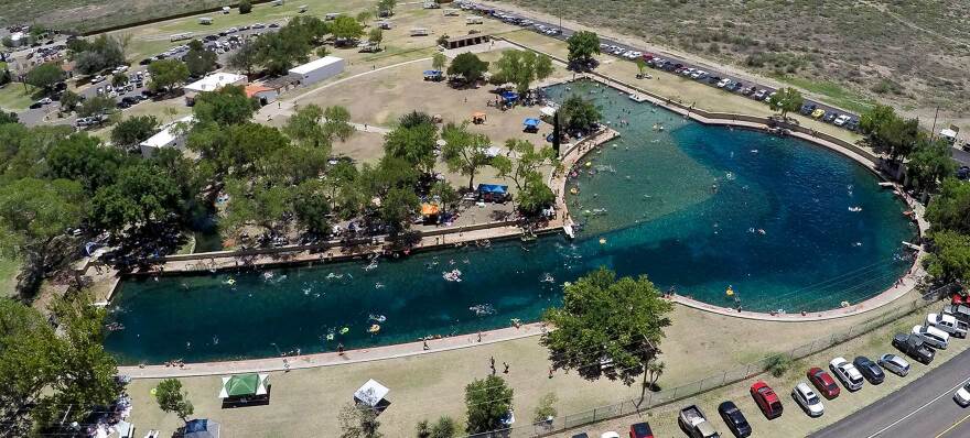 The San Solomon Springs feed the pool at Balmorhea State Park, pictured here in an aerial view, and are vital for local farmers and endangered desert fish. But flows from the springs have declined in recent decades.