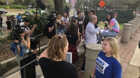 Marjory Stoneman Douglas High School senior Jaclyn Corin, right, and other students who founded March For Our Lives after the Feb. 14 shooting, talk to reporters following a press conference near the state Capitol in Tallahassee.