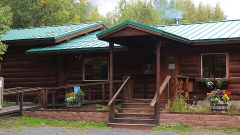 Flowers bloom outside of the Cooper Landing Community Library on Saturday, Aug. 31, 2024 in Cooper Landing, Alaska.