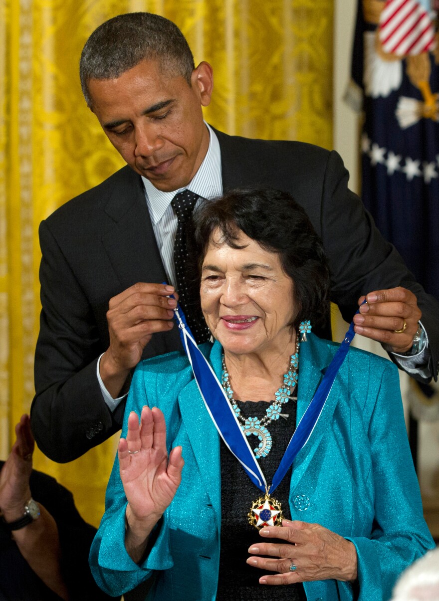 President Barack Obama awards American labor leader and civil rights activist Dolores Clara Fernandez Huerta the Presidential Medal of Freedom, during a ceremony in the East Room of the White House in Washington on May 29, 2012.
