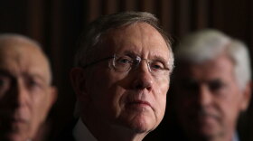 Senate Majority Leader Harry Reid of Nevada (center), flanked by fellow Democratic Sens. Frank Lautenberg of New Jersey (left) and Christopher Dodd of Connecticut, speaks Thursday after the chamber approved a package of changes to the recently passed health care legislation. The measure then was sent to the House for final approval.