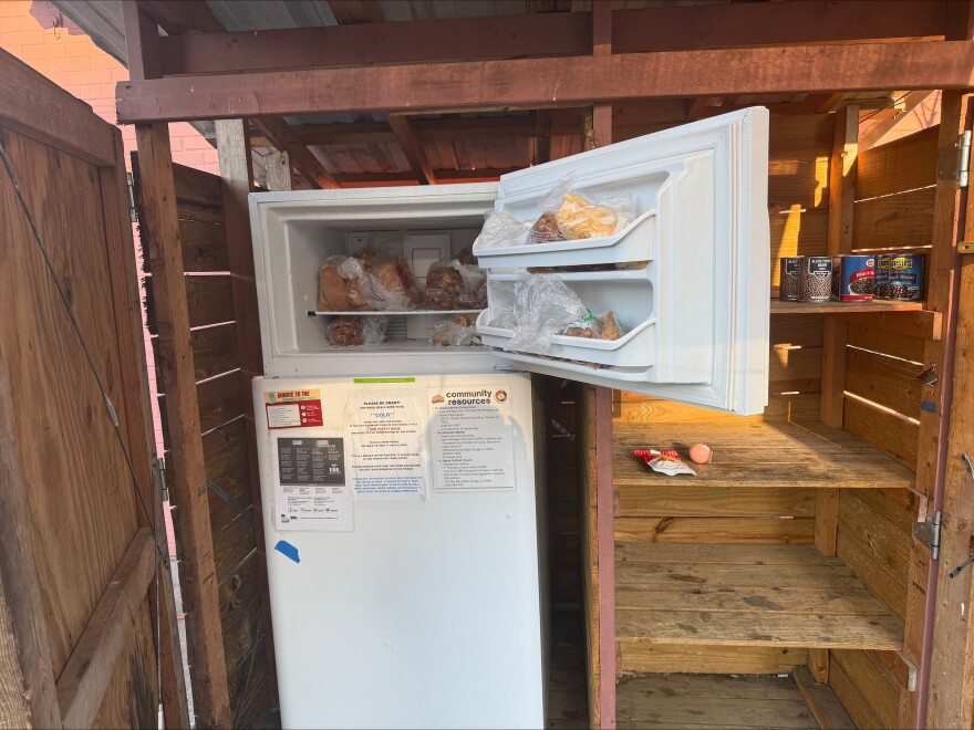 A community fridge at 2303 Government St. provides free food round-the-clock to community members in need. The fridge is stocked by volunteer donors and maintained by the Red Shoes, a local non-profit organization.