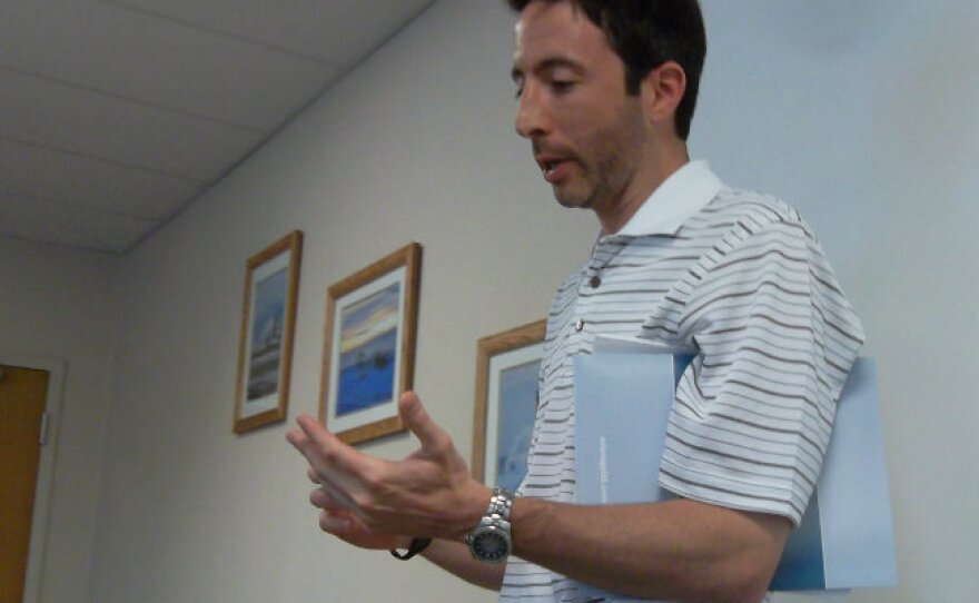 Enbridge spokesman Jason Manshum recounts facts from the 2010 oil spill at the company’s headquarters in Marshall.